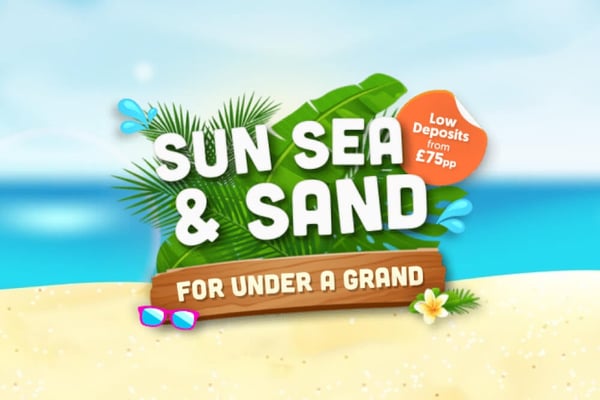 A lounger on a beach with a campaign graphic